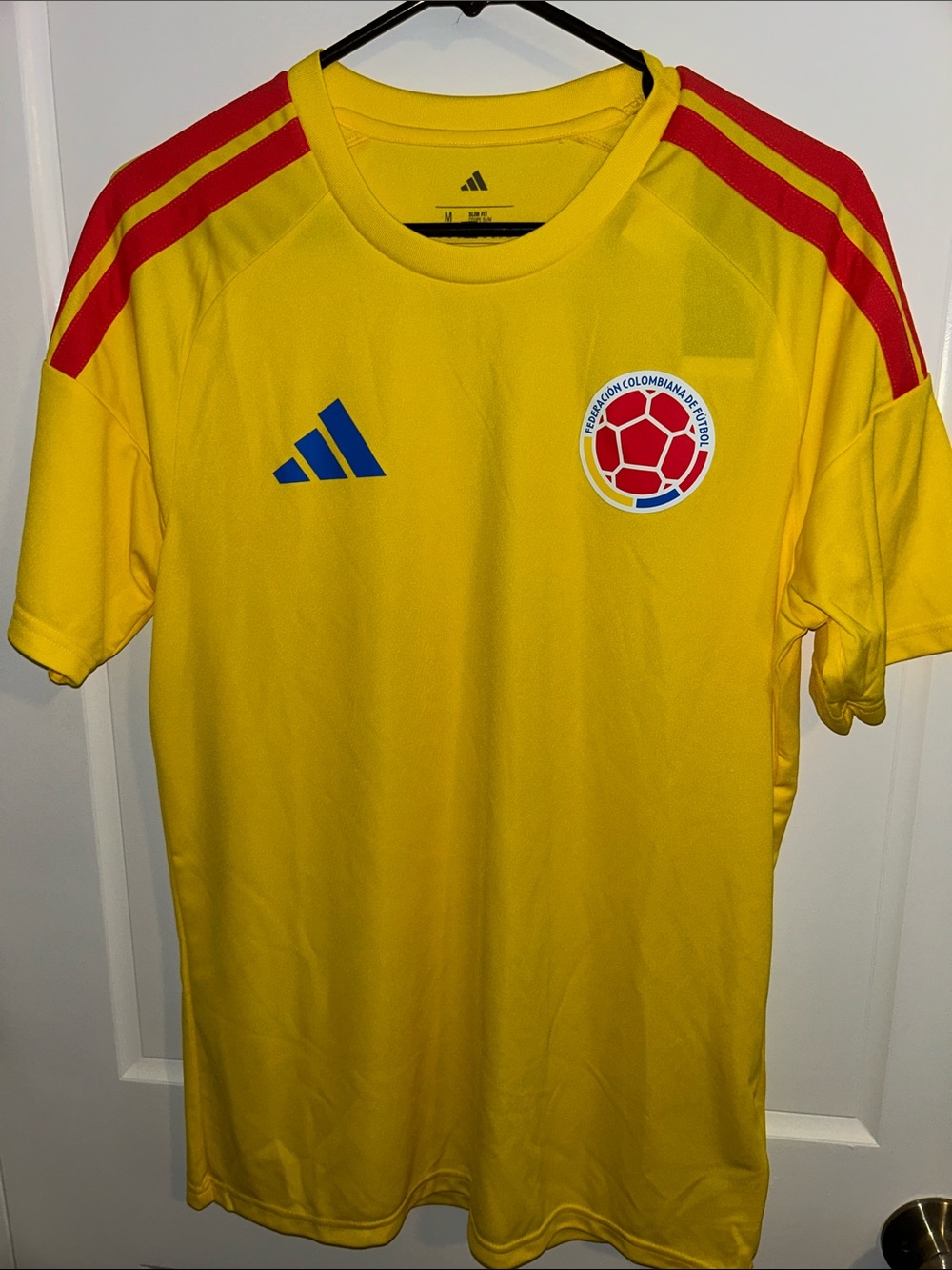 adidas men Yellow Soccer Jersey with Red Shoulder Stripes and Blue Logos